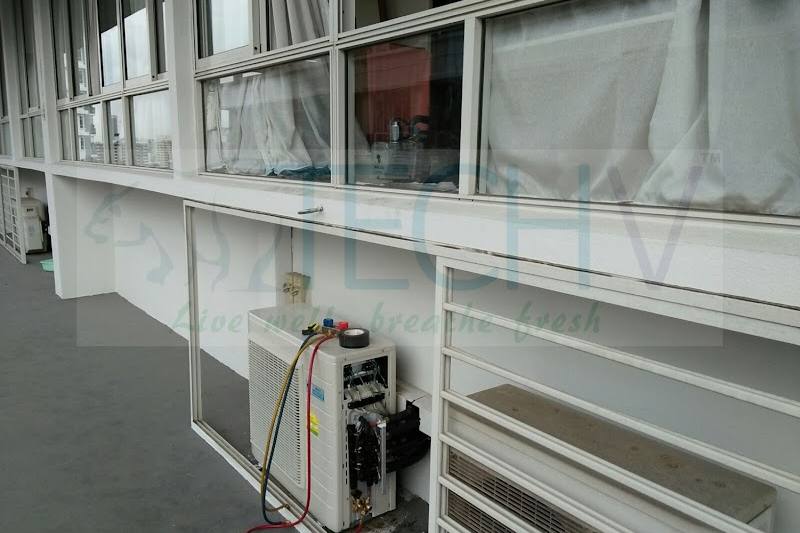 Outdoor aircon units being connected on a ledge by Tech-V Air Conditioning