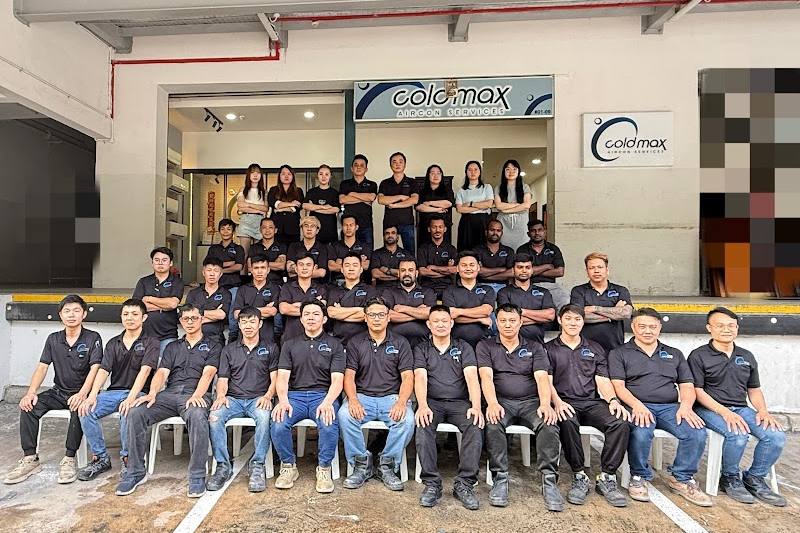 The team outside its office by Cold Max Aircon
