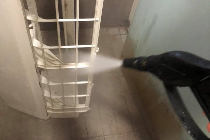 An aircon part being jet-washed by Jetstyle Aircon