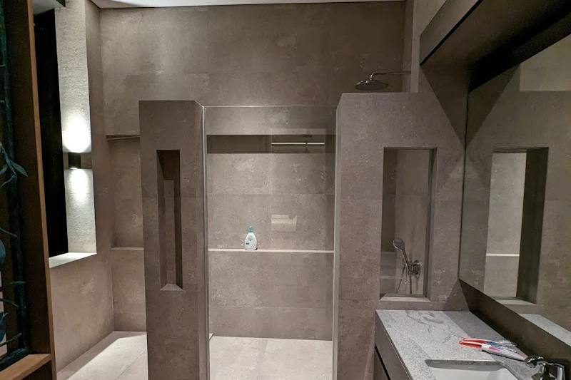 Cleaned bathroom with shower and vanity by Mycleanhome