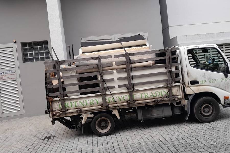 Lorry loaded with old mattresses by Greenery Recycle Trading