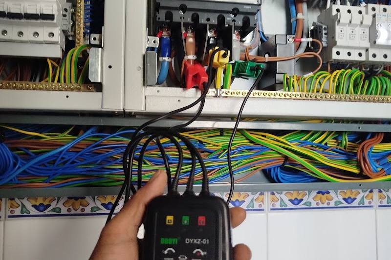 Testing the phase sequence on a new three-phase distribution board by Devniti Electrical Services