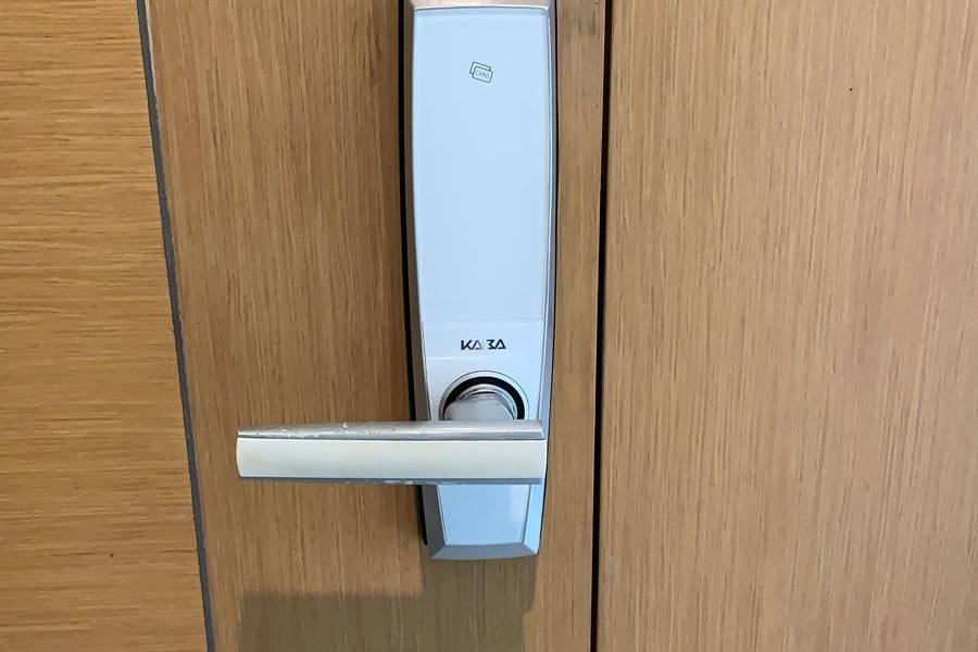 Digital door lock on a wooden door by Botak Locksmiths
