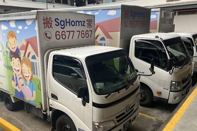 Branded moving trucks by SgHomz Movers