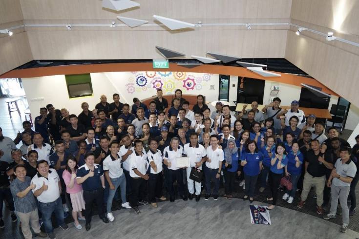 Staff group photo at its office by Shalom Movers