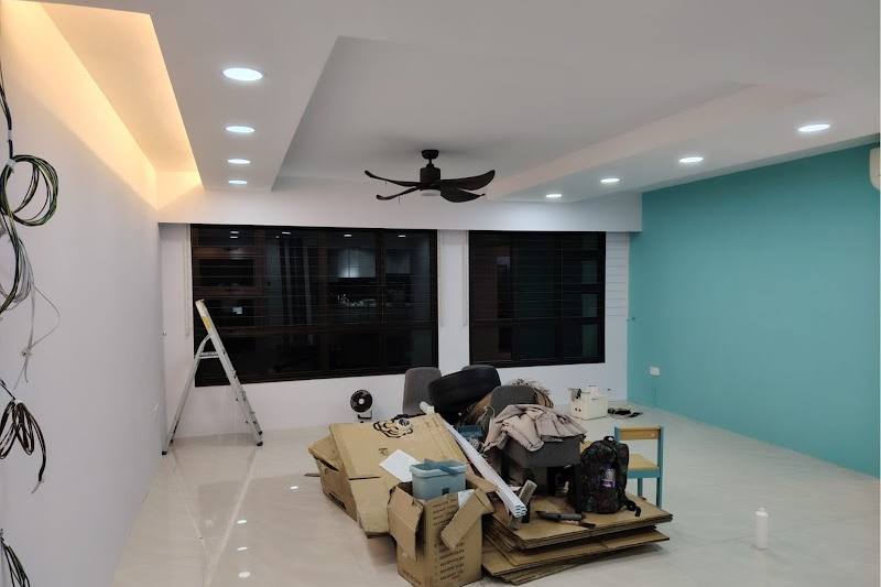 Freshly painted HDB room with a feature wall by AR Contractor