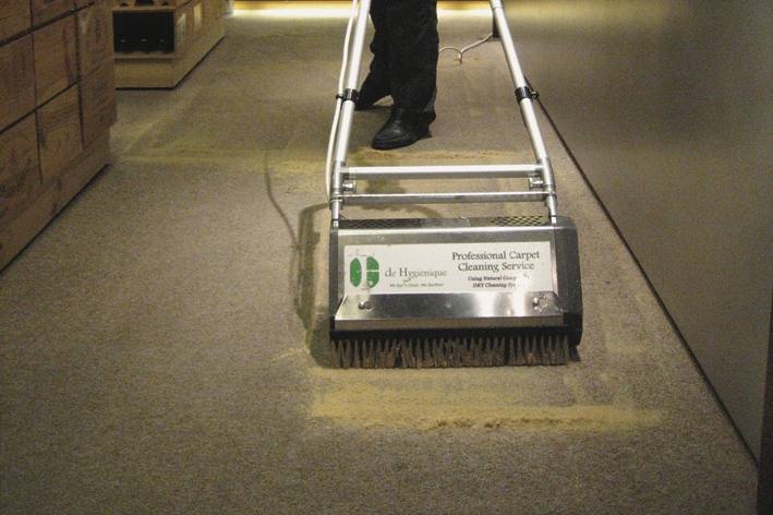 Carpet cleaning machine at work on an office carpet by De Hygienique
