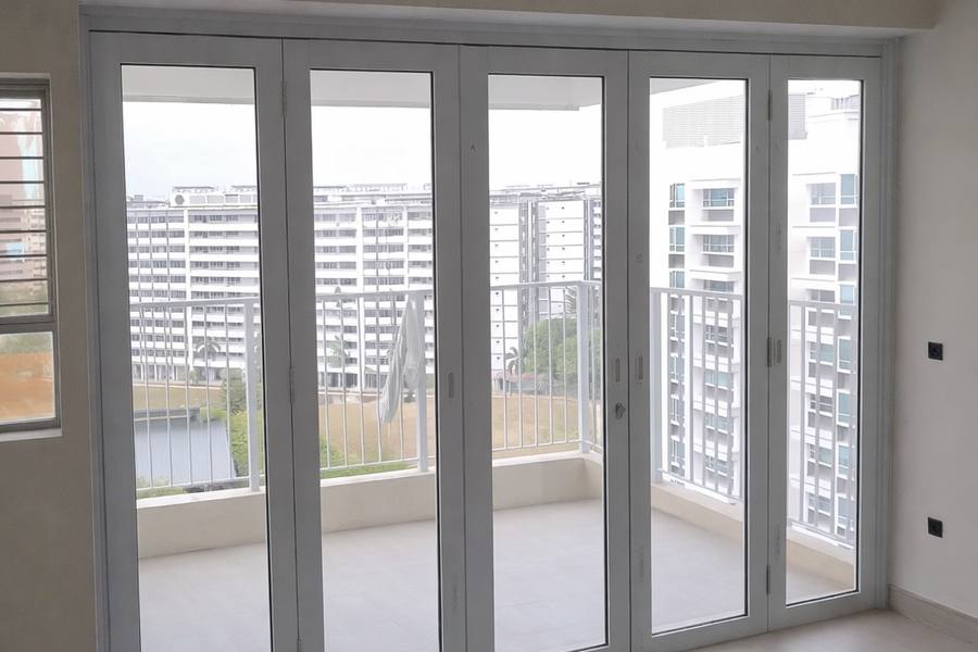 White folding balcony doors fitted in a flat by Ho Ho Engineering